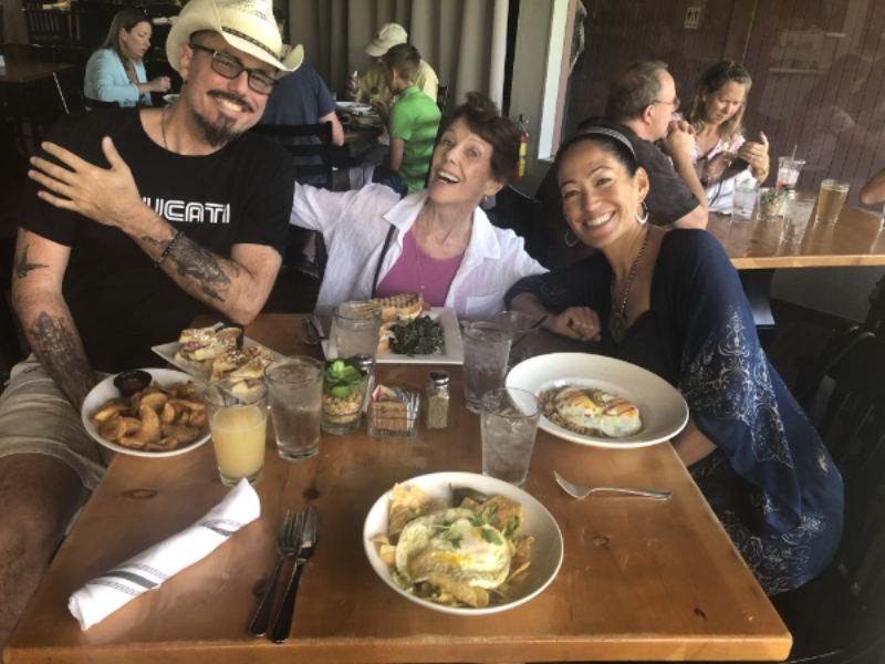 three people at a table